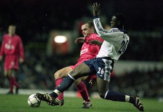 Tottenham defender Ledley King challenges Liverpool's Danny Murphy in a game at White Hart Lane in 2000.