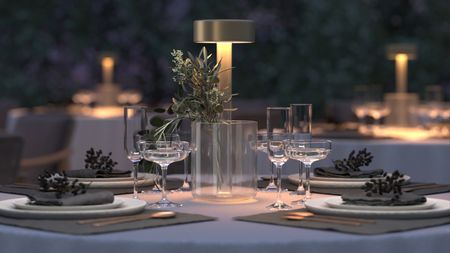 A modern portable table lamp a smart dining table