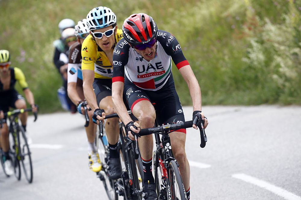 Dan Martin (UAE Team Emirates) climbing ahead of Geraint Thomas (Team Sky) at stage 6 Criterium du Dauphine