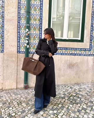 Trench coat and flared jeans outfit