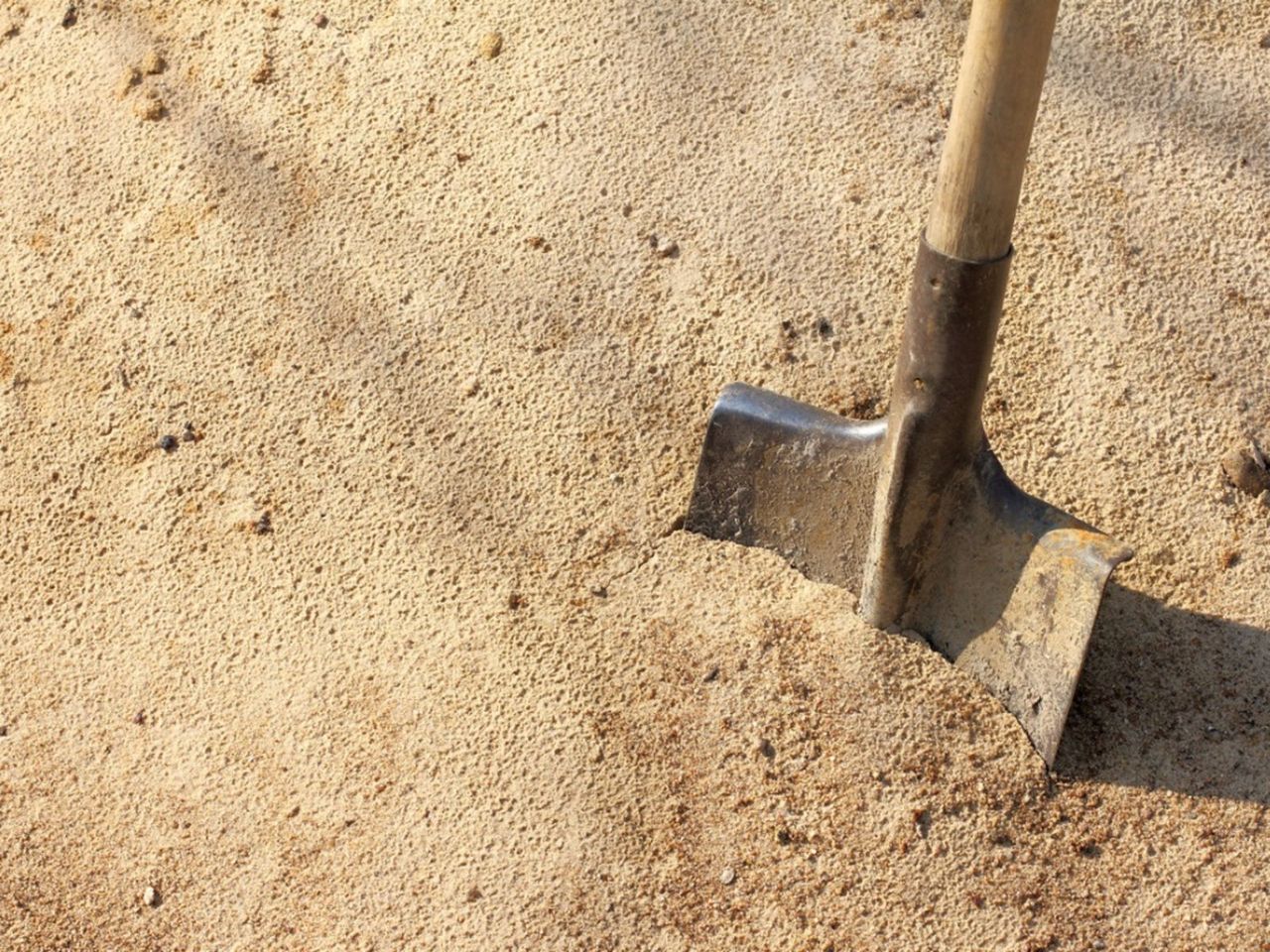 Shovel In Sandy Soil