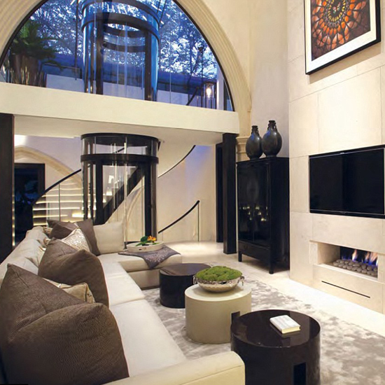 church house with living room having sofa with cushions