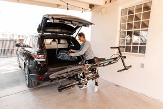 The Thule Epos can be tilted down for trunk access with or without bikes