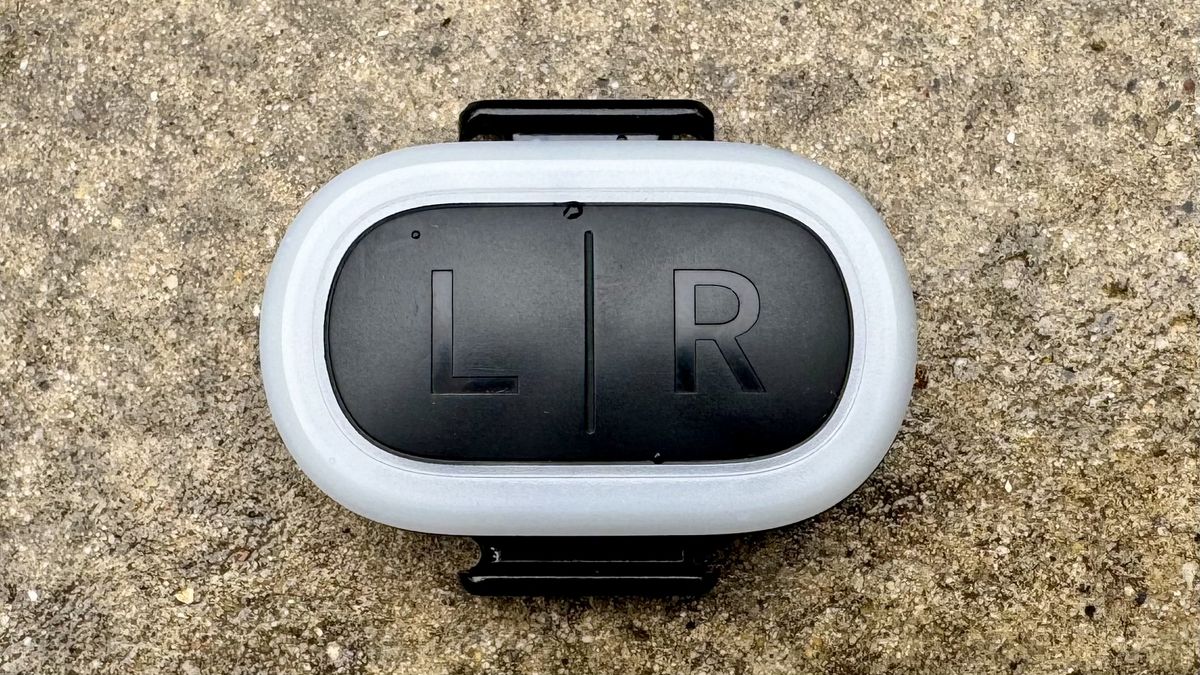 The indicator button that controls the lights on the Abus Hyp-E helmet