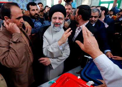 Iranian presidential candidate Ebrahim Raisi votes