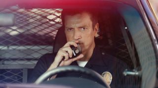 Nathan Fillion as Officer John Nolan in The Rookie.