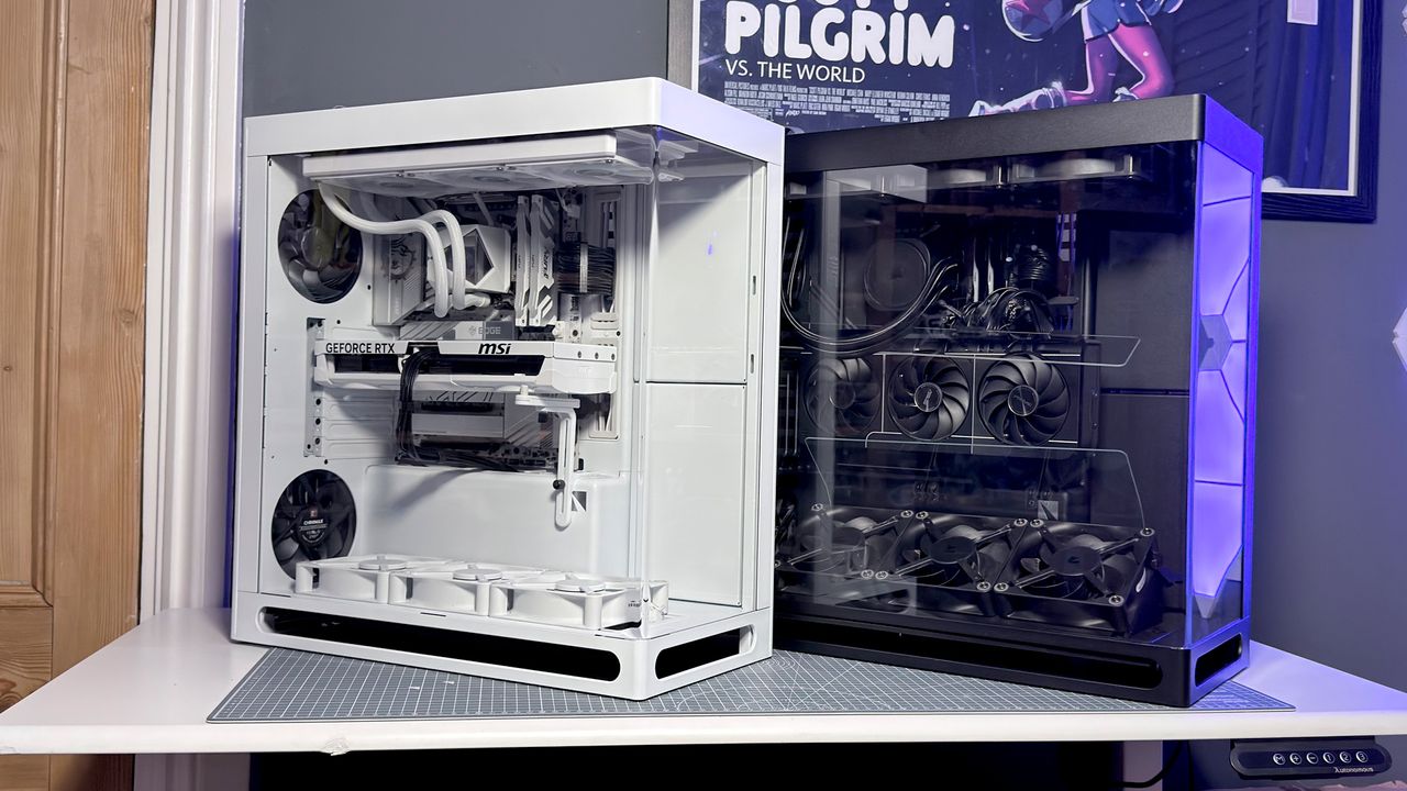 The Havn HS 360 PC case in black and white on a desk.