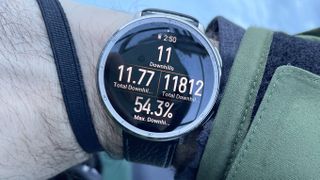 Close-up of the Amazfit Active 2 on a user's wrist while tracking a day of snowboarding