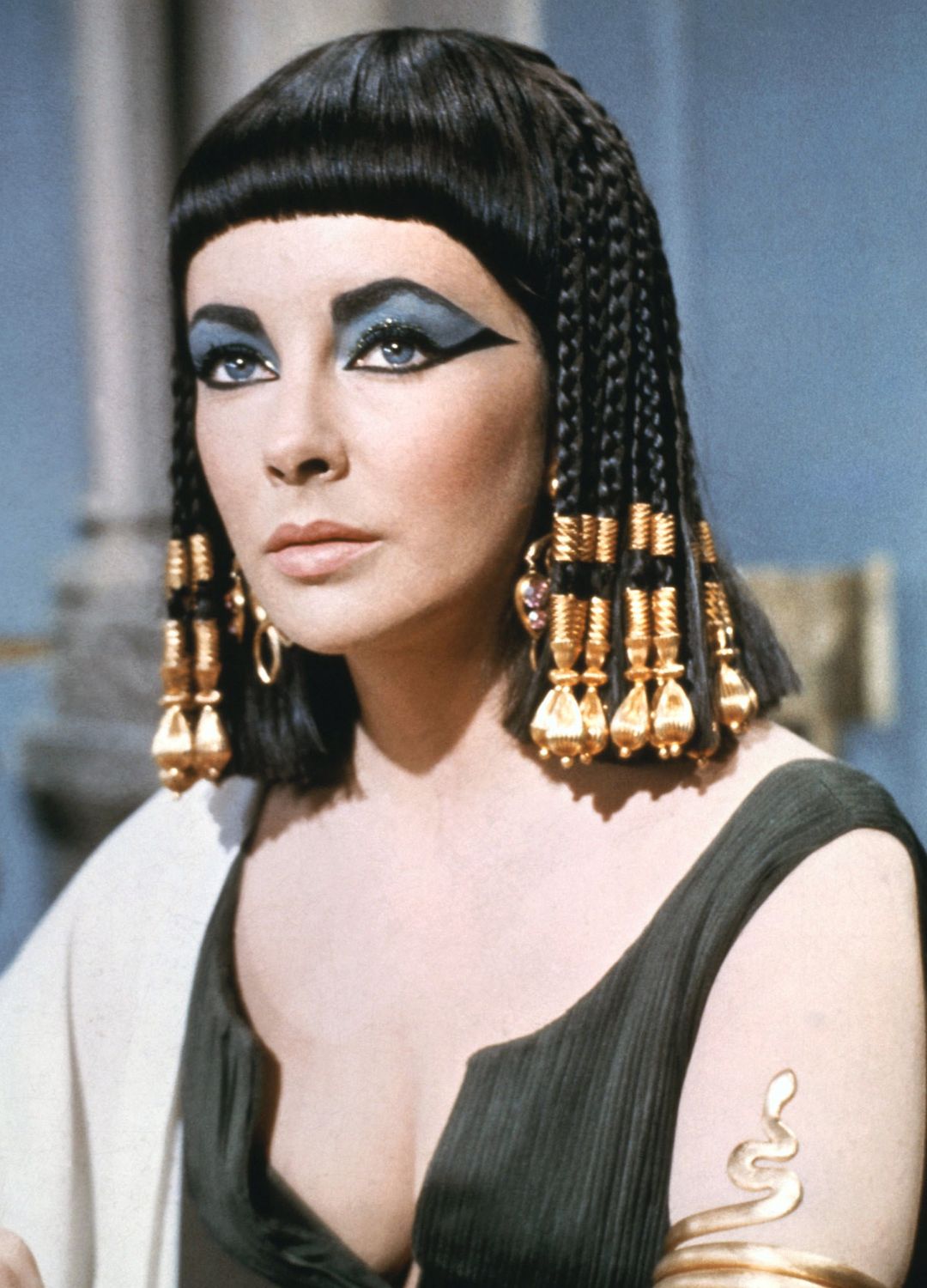 British actress, in costume wearing eye make-up in a publicity still issued for the film, 'Cleopatra', 1963. The historical drama, directed by Joseph L. Mankiewicz (1909-1993), starred Taylor as 'Cleopatra'