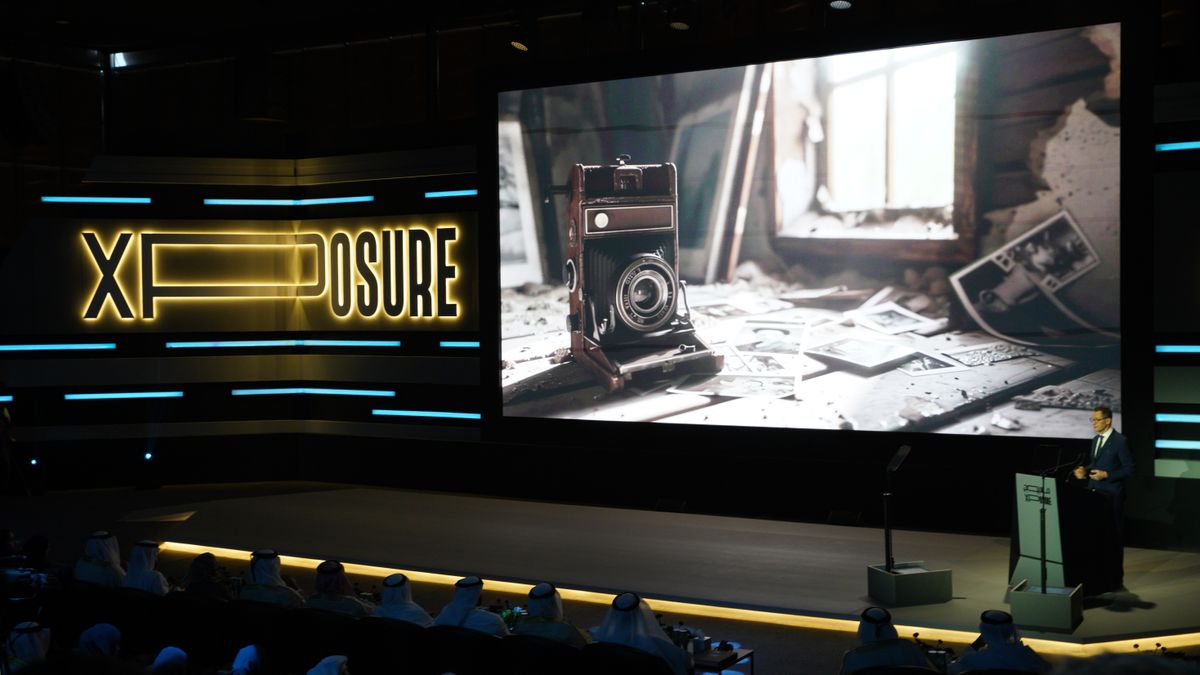 Photograph of the opening ceremony of the ninth edition of the Xposure International Photography Festival, with keynote speaker Sebastian Copeland addressing the assembled dignitaries, speakers, exhibitors, award nominees and international media representatives gathered in Sharjah, the United Arab Emirates 