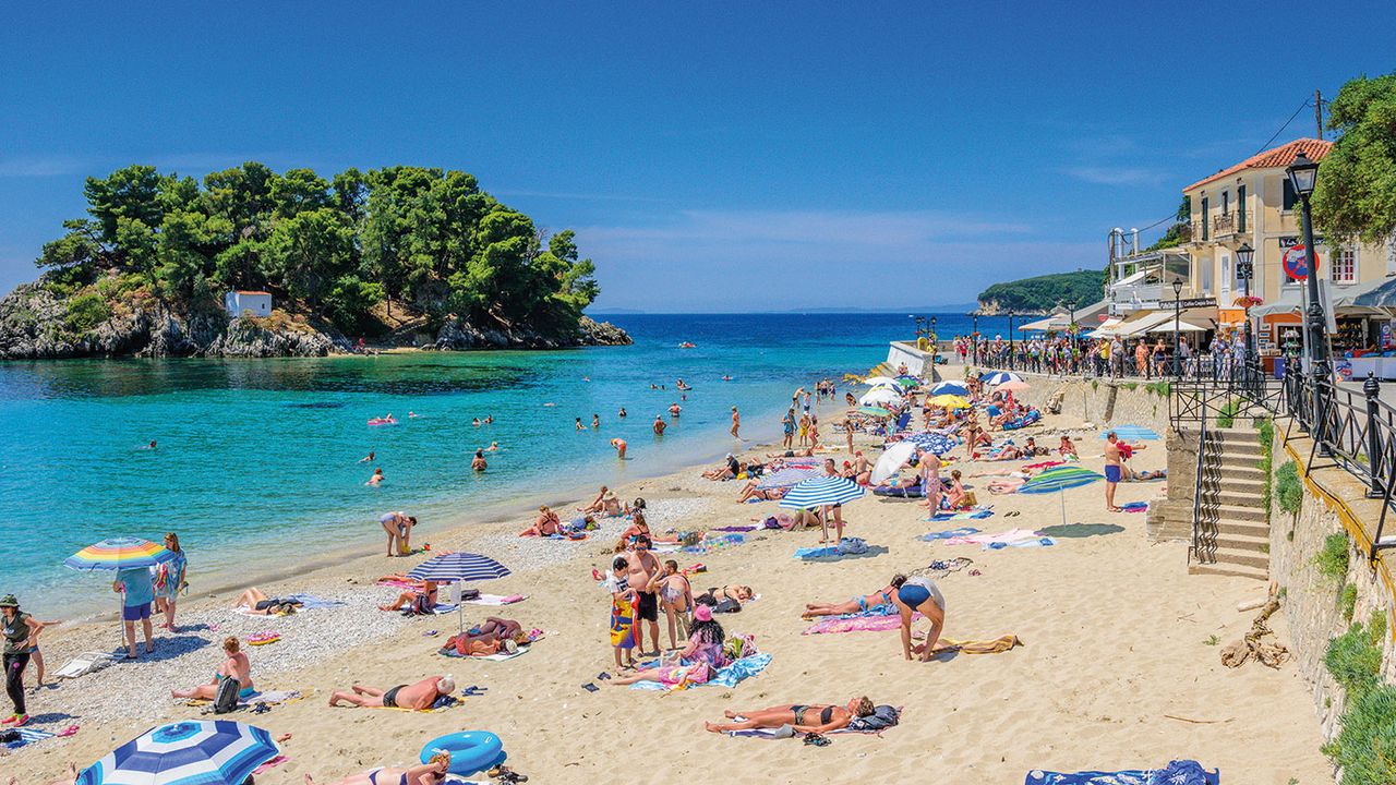 People on a beach in Greece