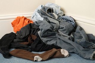 A man's dirty clothes on the floor