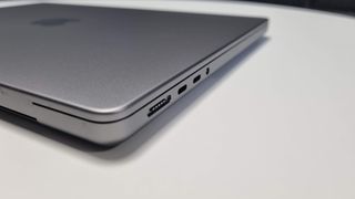 MacBook Pro 14-inch on a table in an officeMacBook Pro 14-inch on a table in an office focusing on the ports