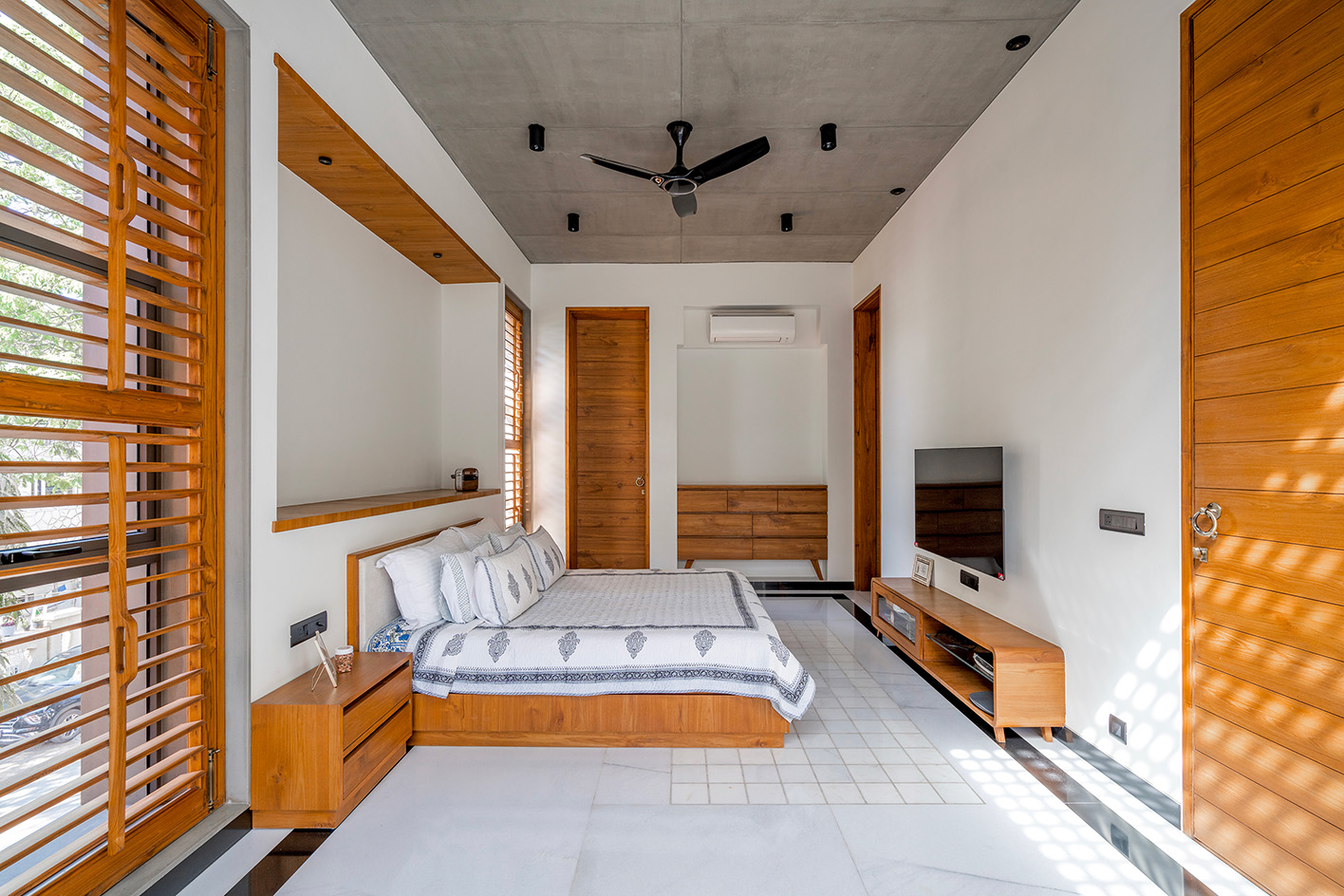 bedroom at An Urban House by MISA Architects