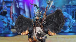 A Stormcast Eternal model riding a griffin monster and wielding an axe looks into the foreground