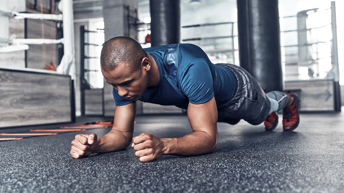 Shirtless Strong Man Tilt and Flex Stock Photo - Image of