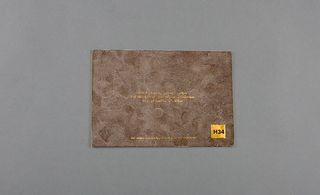 Gold foil detail on the back side of invite