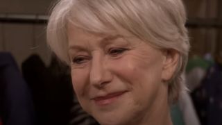 Helen Mirren smiling in the SNL Digital Short, "Helen Mirren's Magical Bosom"