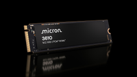 The Micron 3610 SSD rests on a reflective surface on a black background.
