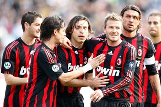 David Beckham and fellow team mates of Milan Team celebrate during the Serie A match between AC Siena and AC Milan at the Artemio Franchi Stadio on MARCH 15, 2009 in Siena, Italy. (Photo by New Press/Getty Images)