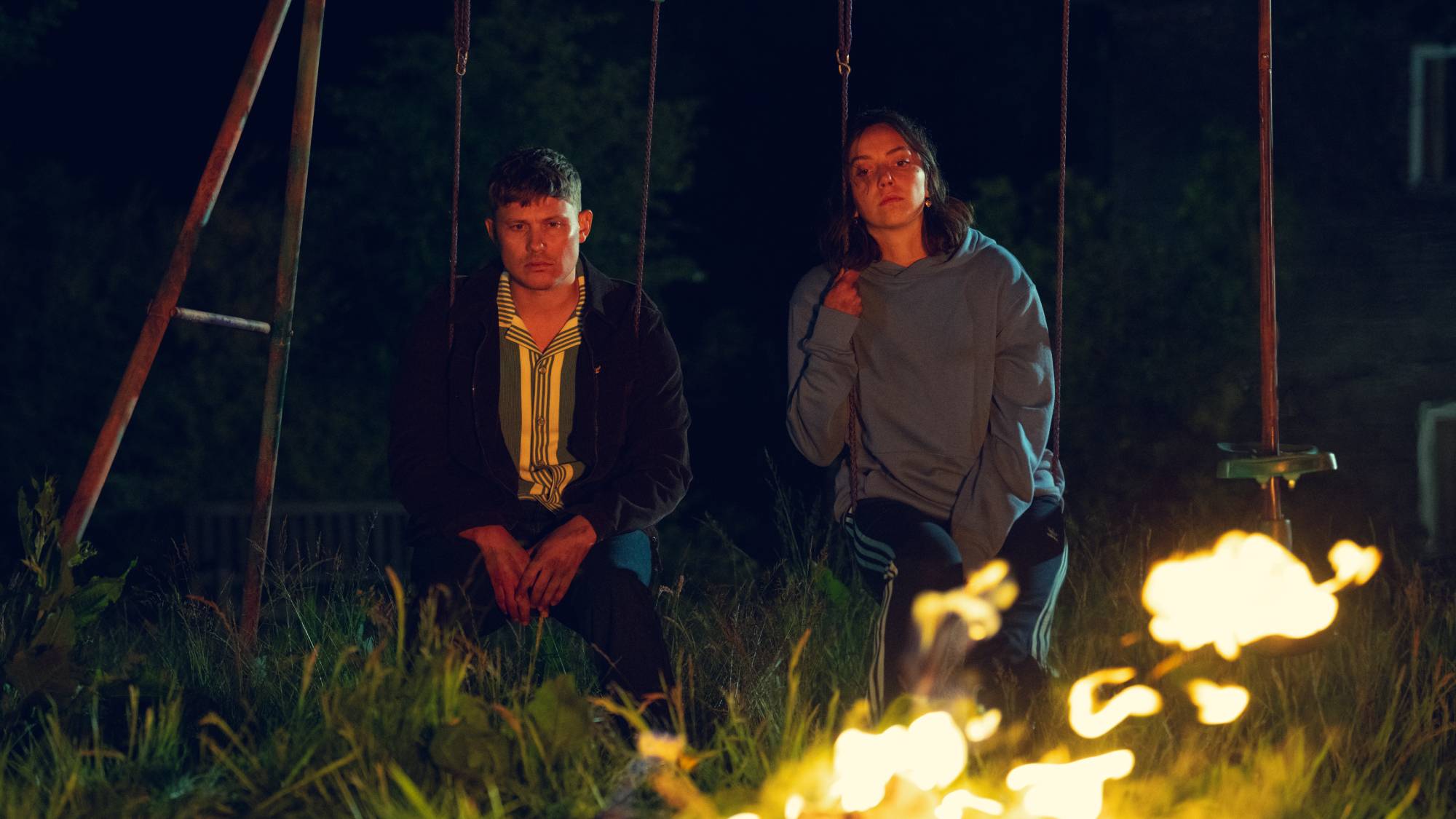 (L-R) Jon Pointing as Ash and Maeve Courtier-Lilley as Dee Dee in "Run Away" on Netflix