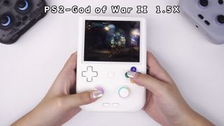 anbernic rg406v gaming handheld playing god of war 2