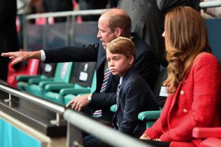 Prince George with Prince William and Kate Middleton