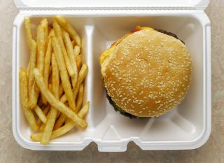 Salty foods like chips and burgers can cause period weight gain
