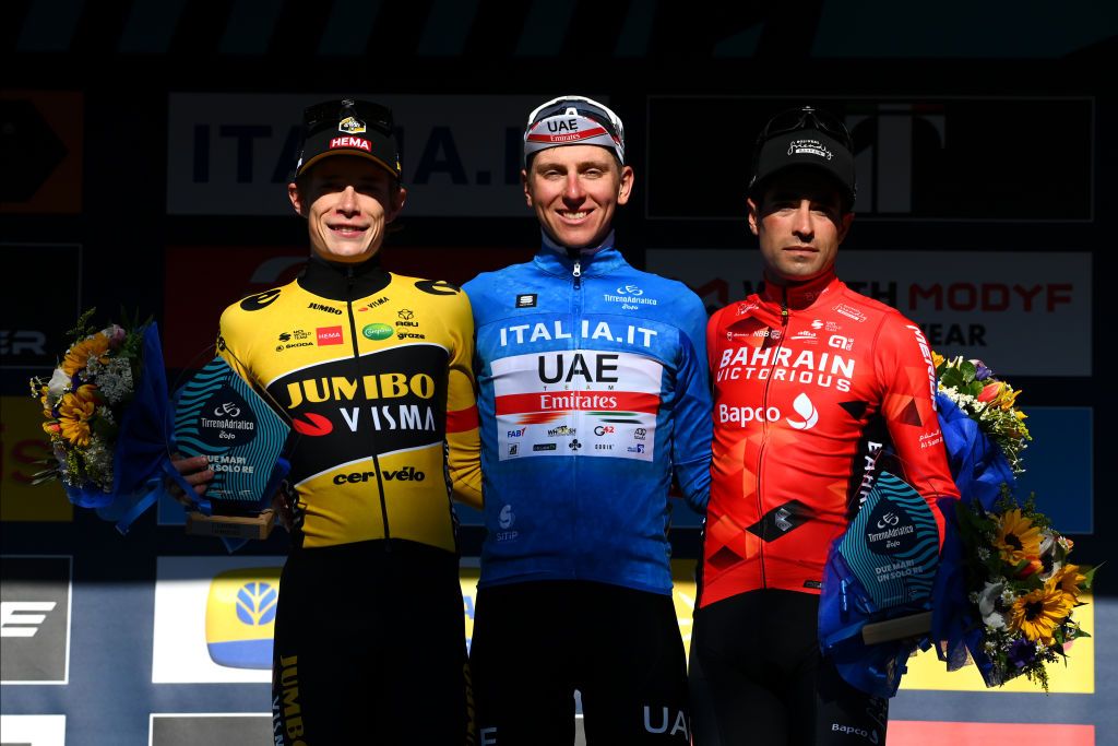 SAN BENEDETTO DEL TRONTO ITALY MARCH 13 LR Jonas Vingegaard Rasmussen of Denmark and Team Jumbo Visma on second place race winner Tadej Pogacar of Slovenia and UAE Team Emirates Blue Leader Jersey and Mikel Landa Meana of Spain and Team Bahrain Victorious on third place pose on the podium ceremony after the 57th TirrenoAdriatico 2022 Stage 7 a 159km stage from San Benedetto del Tronto to San Benedetto del Tronto TirrenoAdriatico WorldTour on March 13 2022 in San Benedetto del Tronto Italy Photo by Tim de WaeleGetty Images