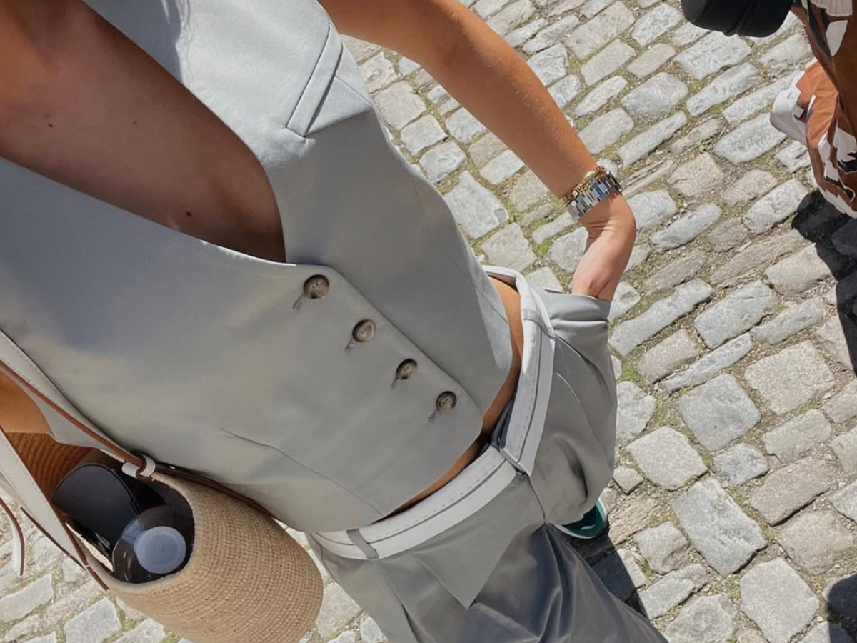 woman wearing matching set vest and pants