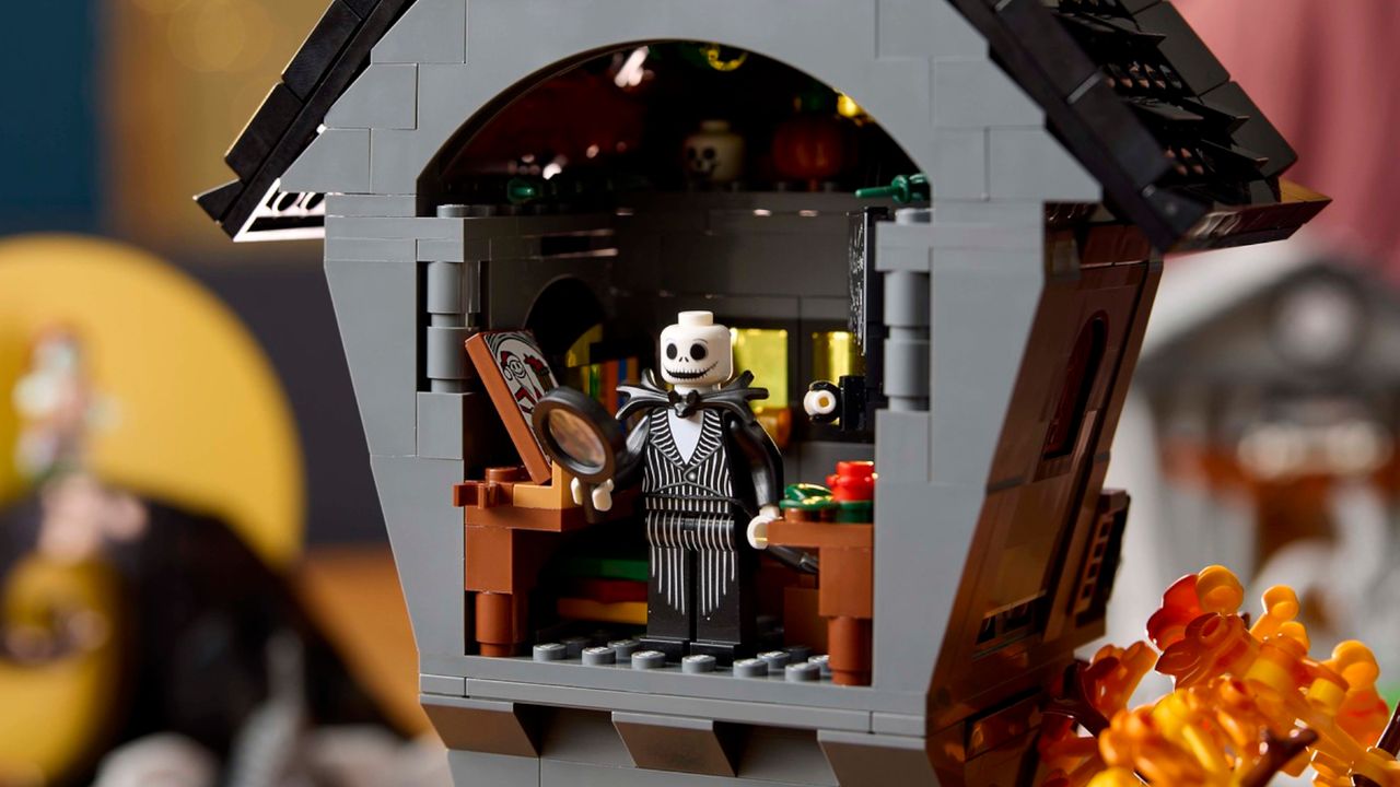 The Lego Nightmare Before Christmas kit in parts, on a wooden table
