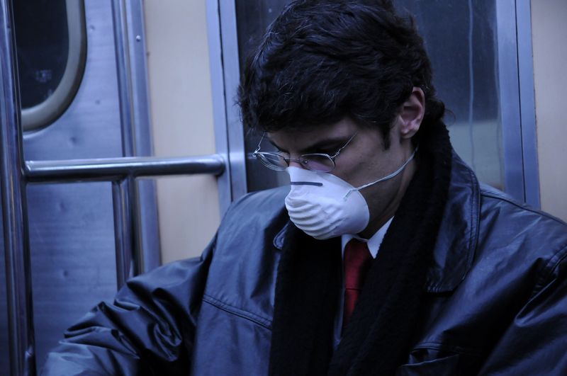 guy with mask to prevent influenza