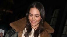 Lauren Silverman wearing leggings, boots and coat on January 20, 2020 in London