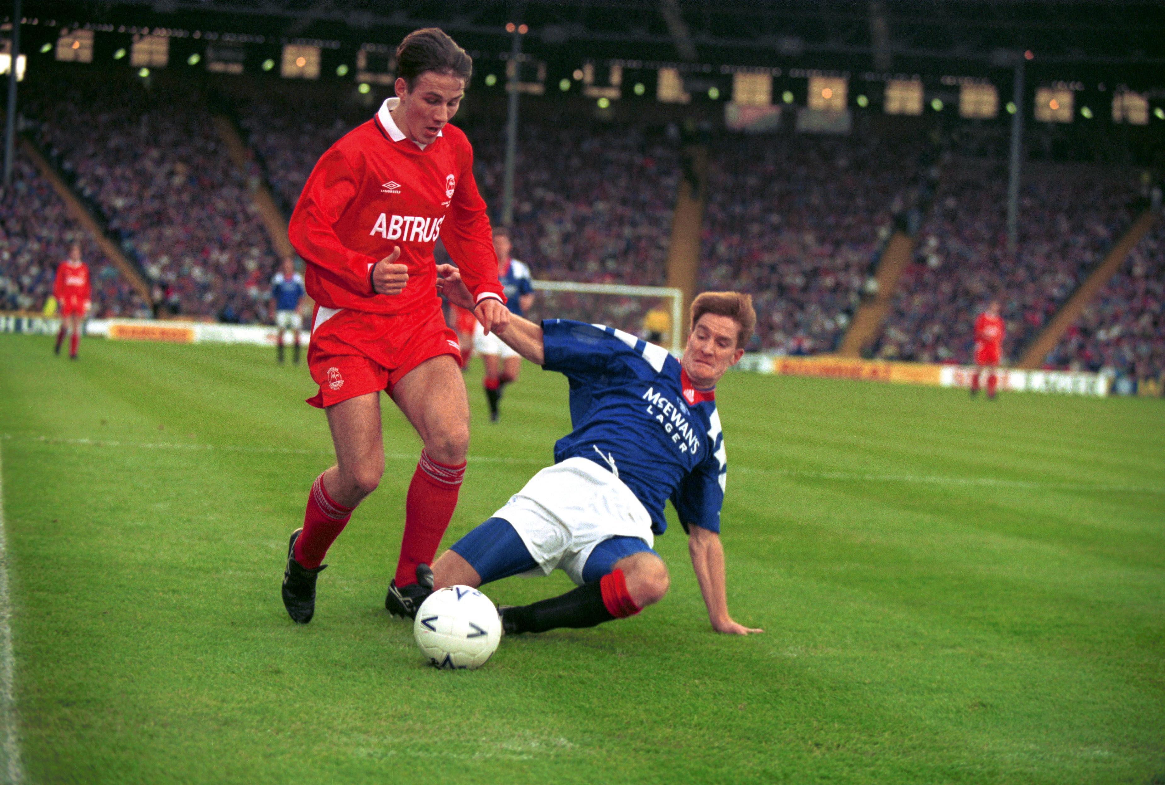 Rangers' Richard Gough tackles Aberdeen's Eoin Jess during the 1992 Scottish League Cup final