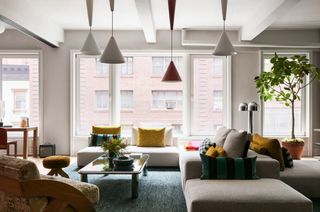 MKCA New York minimal apartment with pendant lighting