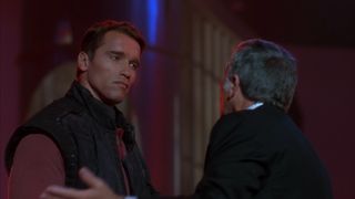 Arnold Schwarzenegger with Richard Dawson in The Running Man