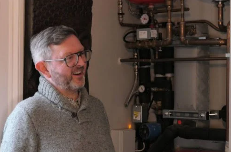 John, a heat pump owner who has signed up to the scheme, with his heat pump system