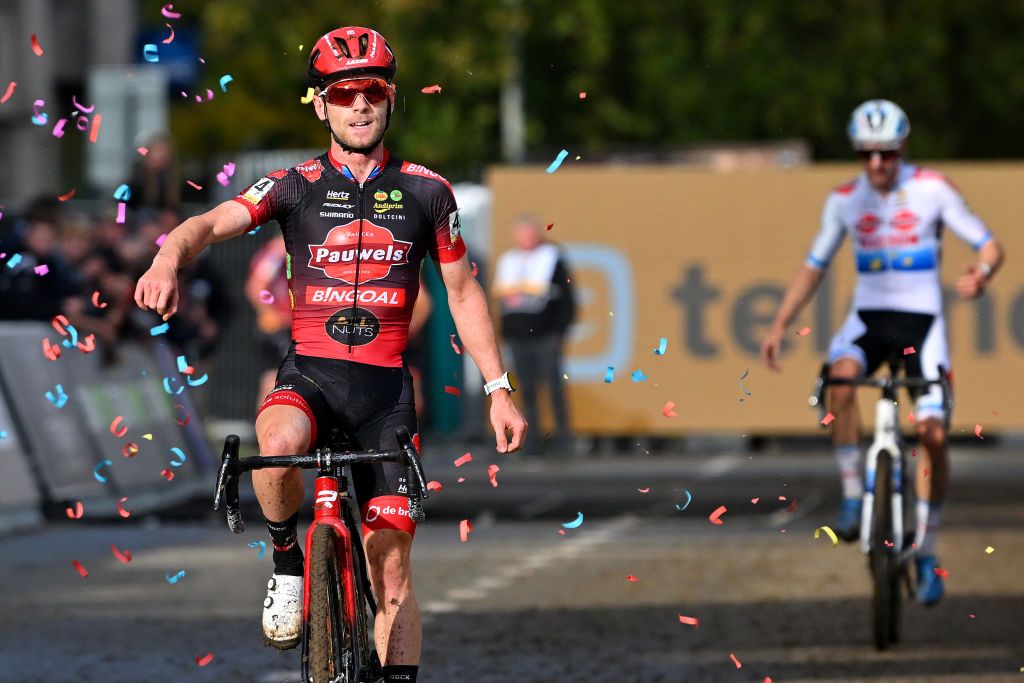 OVERIJSE BELGIUM OCTOBER 22 Eli Iserbyt of Belgium and Team Pauwels Sauzen Bingoal celebrates at finish line as race winner during the 63rd UCI Cyclocross World Cup Druivencross Overijse 2023 Mens Elite on October 22 2023 in Overijse Belgium Photo by Luc ClaessenGetty Images