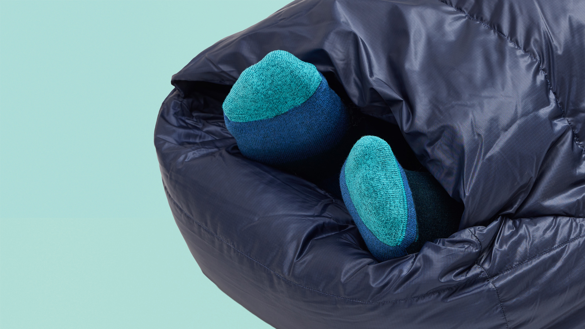 Marmot Wraptor Sleeping Bag on coloured background