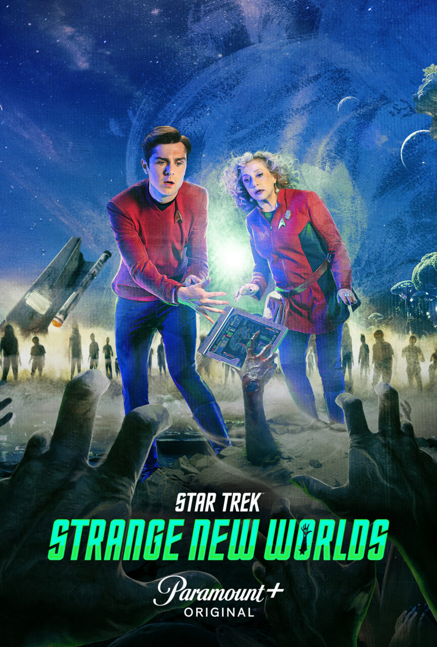 Two red-shirted sci-fi characters in a horror-themed alien graveyard
