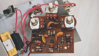The printed circuit board from inside an Electro-Harmonix Big Muff electric guitar effects unit