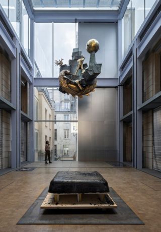 View of the exhibition DUMPTY by Cyprien Gaillard in Lafayette Anticipations. Jacques Monestier, Le Défenseur du Temps, 1979, reactivated by Cyprien Gaillard, 2022. Soundtrack composition, Hit by Cyprien Gaillard, Joe Williams, and Heal by Laraaji. Brass, lead, steel, speakers, microswitches and transducers