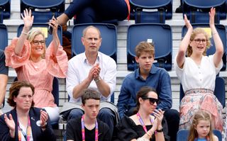 Duchess Sophie, Prince Edward, James and Lady Louise Windsor cheering in the stands at the Commonwealth Games