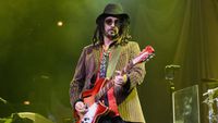 Mike Campbell of Tom Petty and the Heartbreakers performs on stage at United Center on August 23, 2014 in Chicago, United States