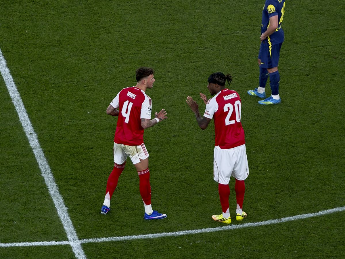 Action photos during a Champions League soccer match at Arsenal's Emirates stadium, taken with the Oppo Find X9 Ultra and teleconverter lens