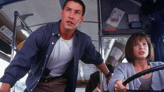 Keanu Reeves and Sandra Bullock control a bus in Speed