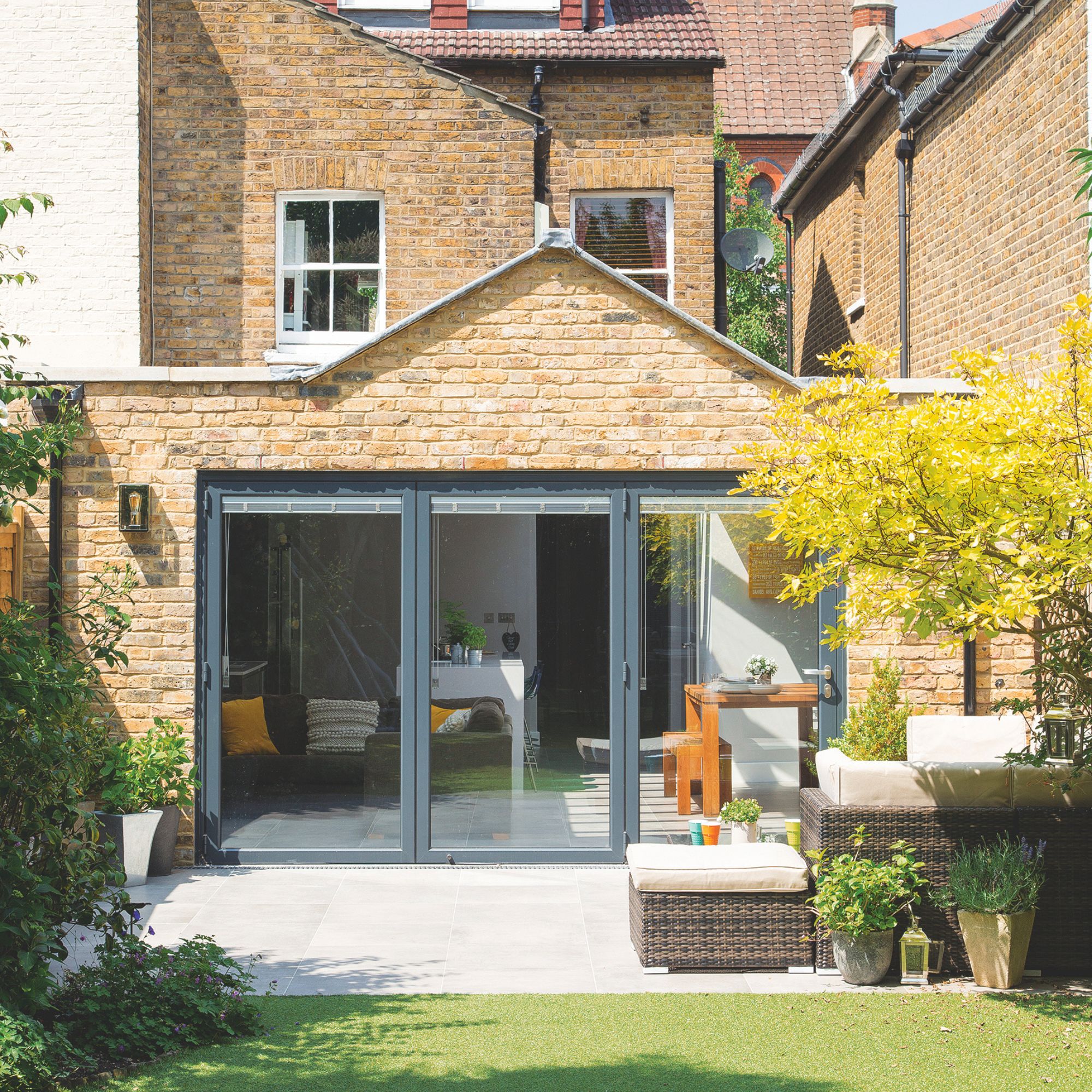 A garden facing patio doors leading into the home