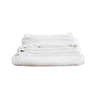 Cultiver Linen Sheet Set With Pillowcases in white, folded