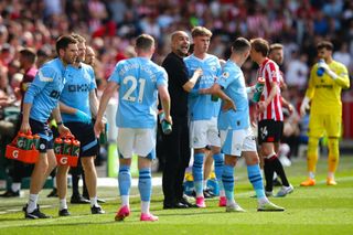 Manchester City manager Pep Guardiola gives instructions to his team during the Premier League match between Brentford FC and Manchester City at Gtech Community Stadium on May 28, 2023 in Brentford, England. (Photo by Craig Mercer/MB Media/Getty Images)