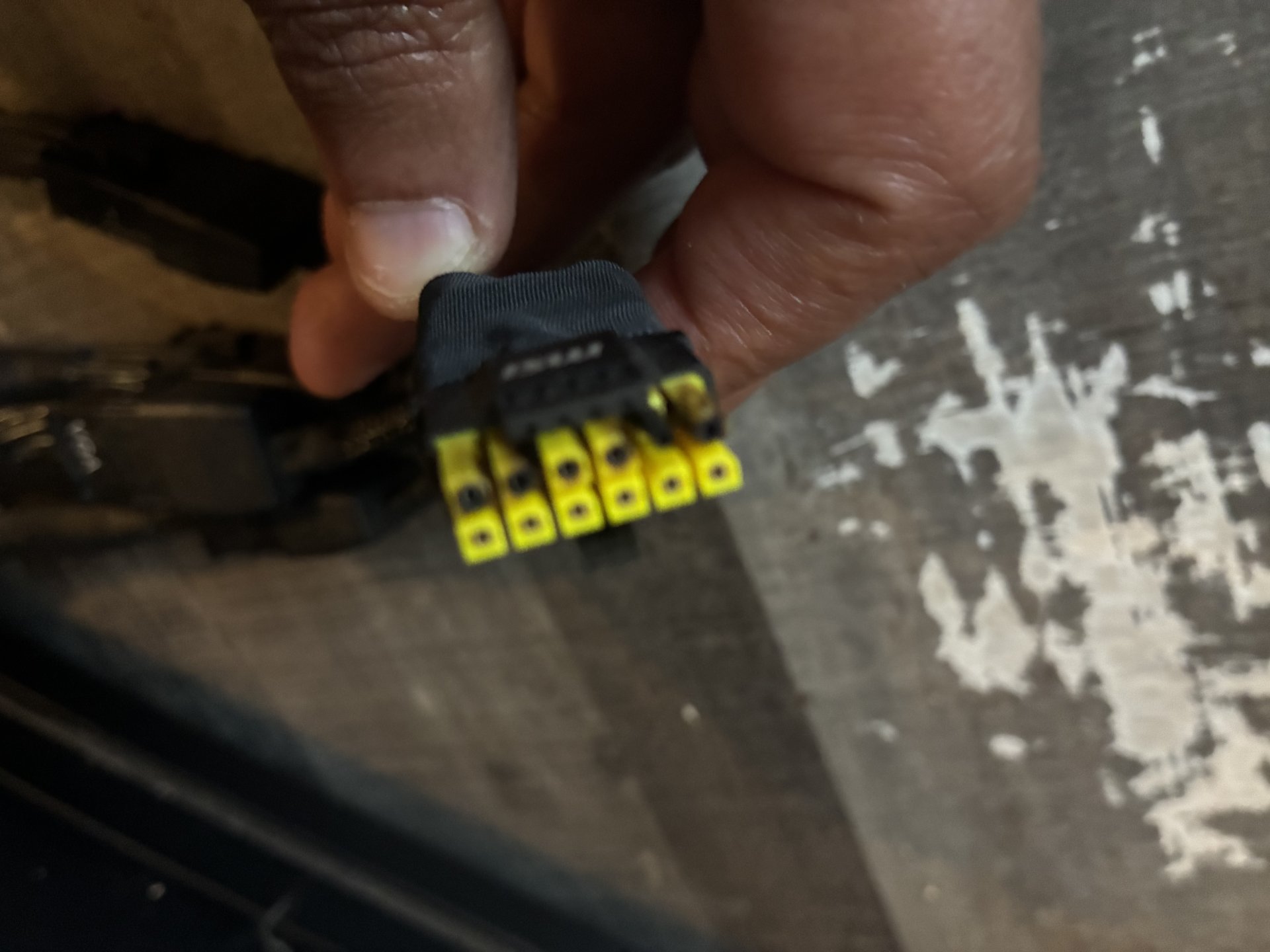 A post-DLSS 5 RTX 5090 suffering from a genetic disease known as its 16-pin connector melting